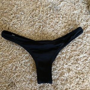 Cheeky black bikini bottoms